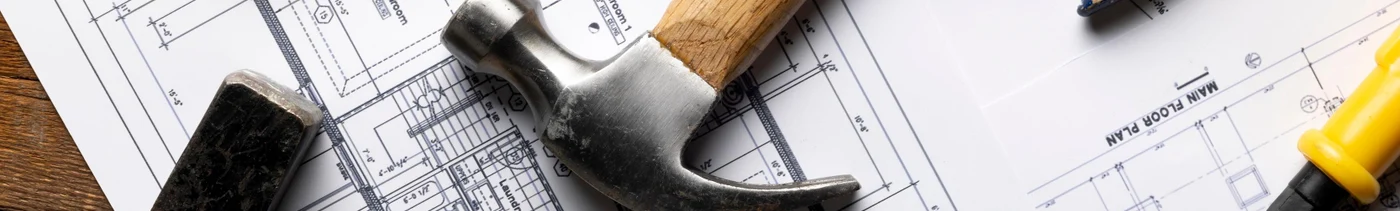 95d54d17-2019-4559-8a8c-cb318576efbb-top-view-construction-hammers-still-life.jpg